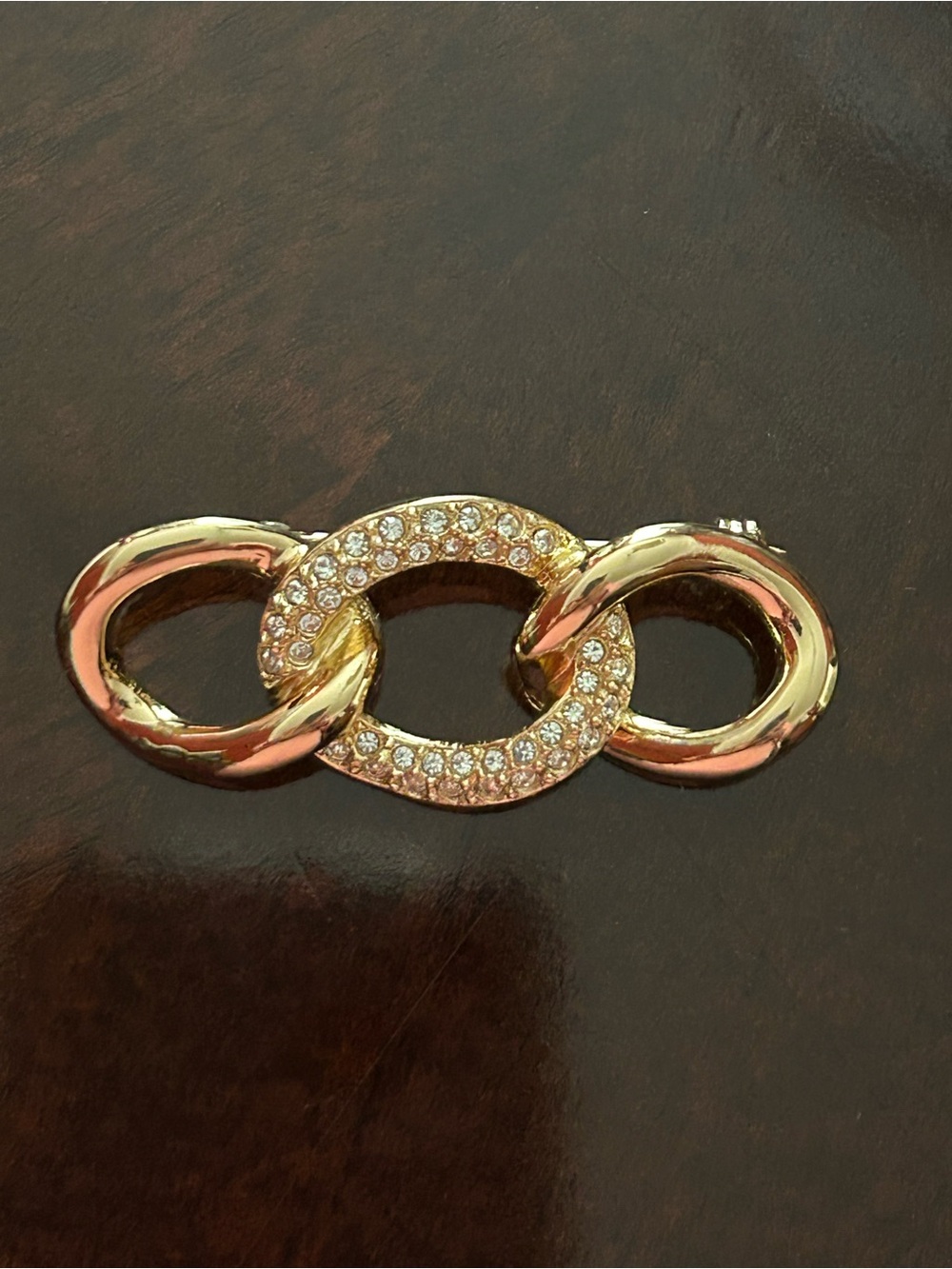 Vintage Christian Dior gilded chain link brooch with pave crystals. Signed pin.